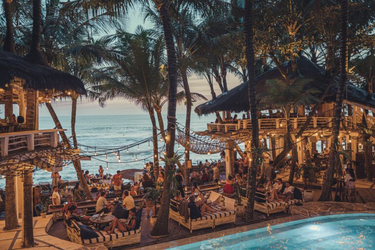 La Brisa’s oceanfront seating and pool at sunset